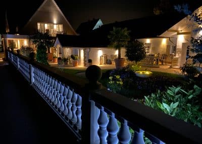 Wilsmann Apartmentvermietung - Der Garten am Abend